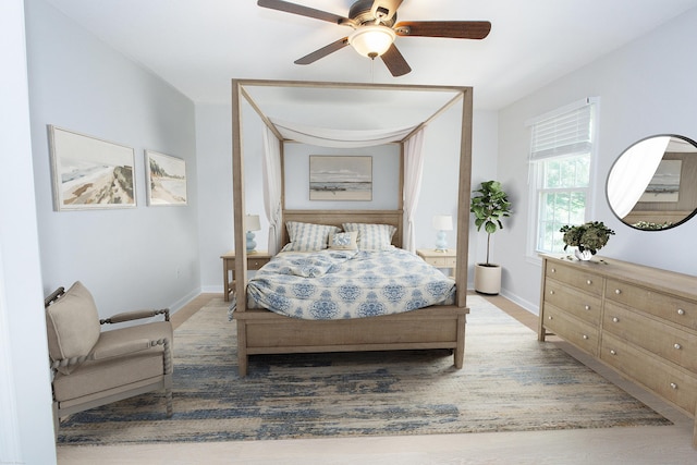 14 Hubbard Run Dr Unit 14, Glastonbury, CT 06033 - bedroom with baseboards, wood finished floors, and a ceiling fan