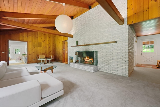 58 Lantern Ridge Rd, New Canaan, CT 06840 - carpeted living area featuring a brick fireplace, wood ceiling, and wooden walls