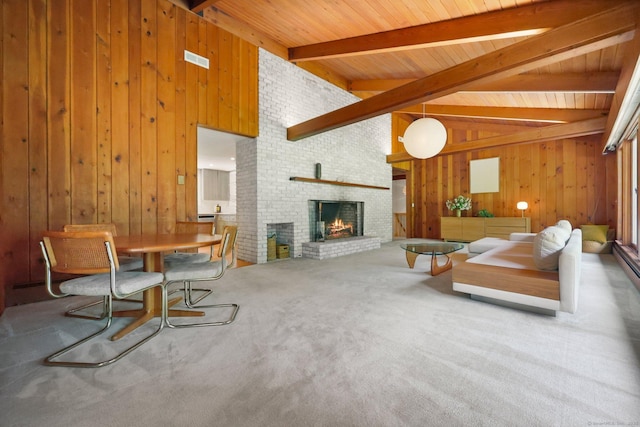 58 Lantern Ridge Rd, New Canaan, CT 06840 - living area with wooden walls, a fireplace, wood ceiling, and carpet floors