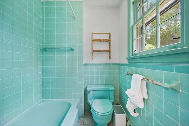 58 Lantern Ridge Rd, New Canaan, CT 06840 - bathroom with toilet, wainscoting, and tile walls