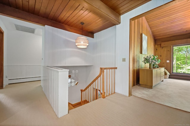58 Lantern Ridge Rd, New Canaan, CT 06840 - hallway with an upstairs landing, wooden ceiling with exposed beams, carpet, baseboard heating, and wooden walls