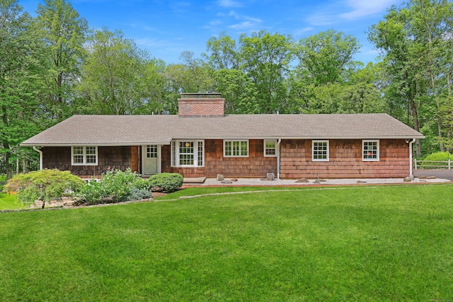 58 Lantern Ridge Rd, New Canaan, CT 06840 - single story home featuring a chimney, a front yard, and roof with shingles