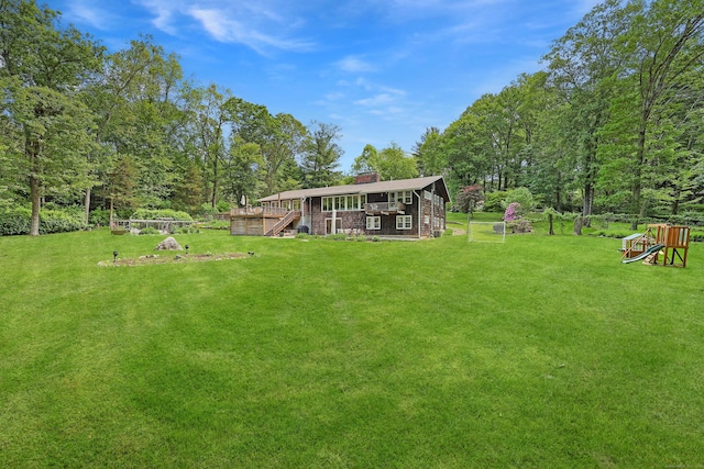 58 Lantern Ridge Rd, New Canaan, CT 06840 - view of green lawn with stairway and a deck