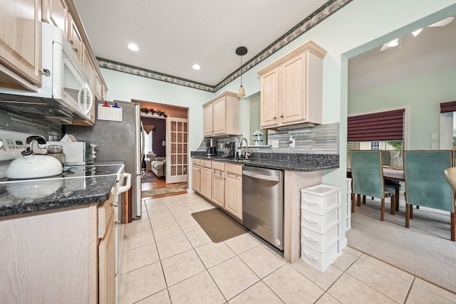 136 Thistle Pond Dr Unit 136, Bloomfield, CT 06002 - kitchen featuring dishwasher, white microwave, light tile patterned flooring, light brown cabinetry, and recessed lighting