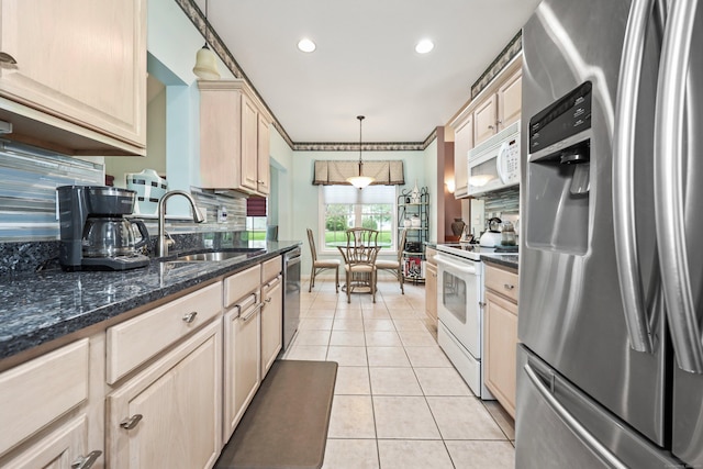 136 Thistle Pond Dr Unit 136, Bloomfield, CT 06002 - kitchen featuring appliances with stainless steel finishes, a sink, light tile patterned floors, ornamental molding, and recessed lighting