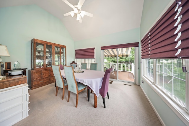 136 Thistle Pond Dr Unit 136, Bloomfield, CT 06002 - dining area with light colored carpet, ceiling fan, high vaulted ceiling, and baseboards