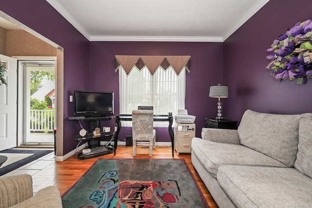 136 Thistle Pond Dr Unit 136, Bloomfield, CT 06002 - living area featuring wood finished floors, crown molding, and baseboards