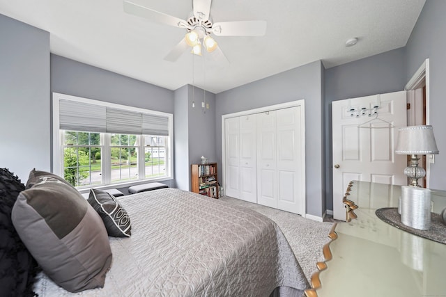 136 Thistle Pond Dr Unit 136, Bloomfield, CT 06002 - carpeted bedroom with a closet, ceiling fan, and baseboards