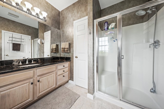 136 Thistle Pond Dr Unit 136, Bloomfield, CT 06002 - full bath with a stall shower, tile patterned floors, and vanity