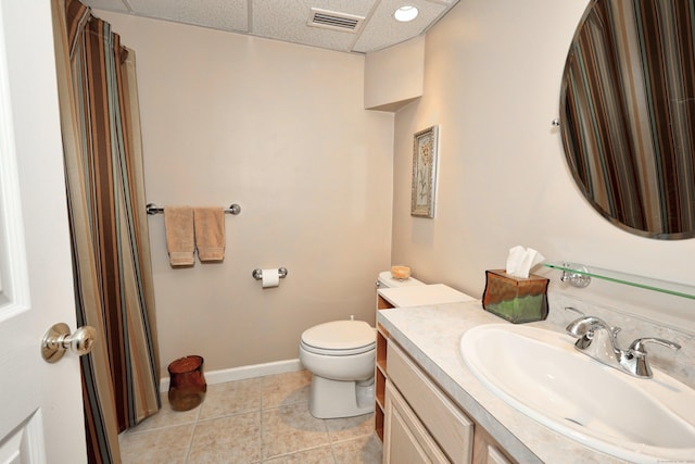 136 Thistle Pond Dr Unit 136, Bloomfield, CT 06002 - full bathroom with vanity, toilet, tile patterned floors, a drop ceiling, and baseboards