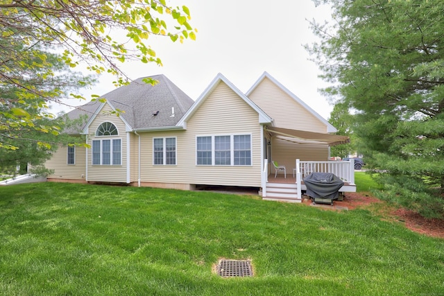 136 Thistle Pond Dr Unit 136, Bloomfield, CT 06002 - back of property featuring a deck and a yard