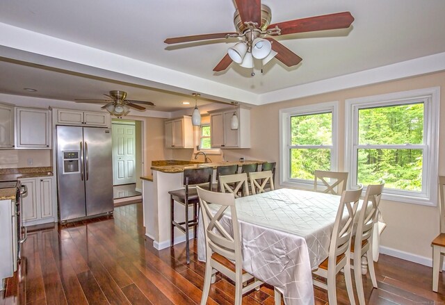 407 Monson Rd, Wilbraham, MA 01095 - dining room featuring ceiling fan and dark wood-type flooring