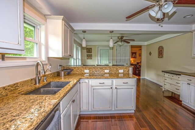 407 Monson Rd, Wilbraham, MA 01095 - kitchen with a peninsula, ceiling fan, white cabinetry, decorative light fixtures, and light stone counters