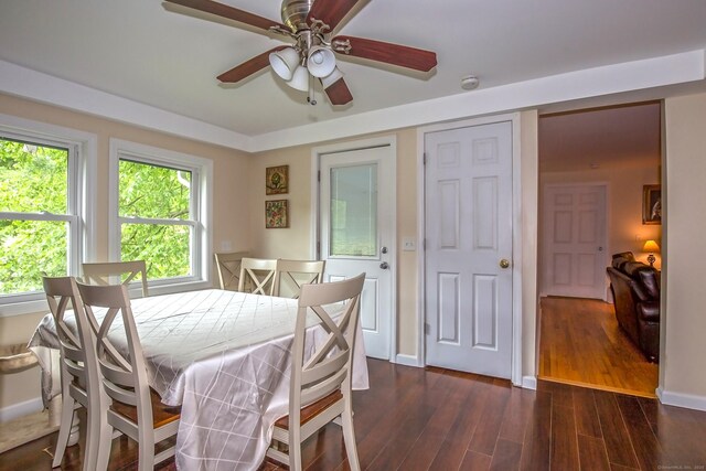 407 Monson Rd, Wilbraham, MA 01095 - dining room with a ceiling fan and dark wood-style floors