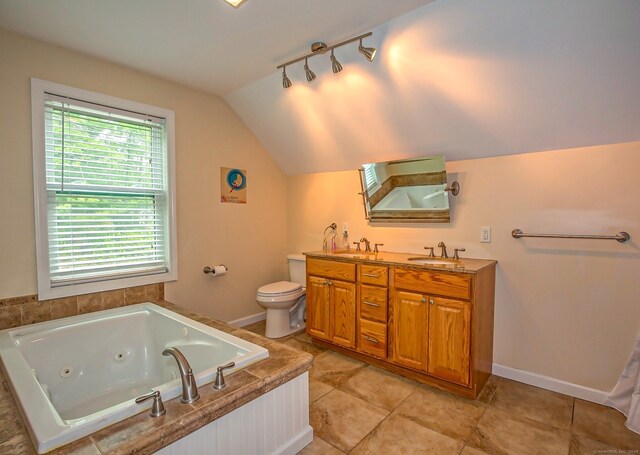 407 Monson Rd, Wilbraham, MA 01095 - full bathroom featuring lofted ceiling, double vanity, a jetted tub, and tile patterned flooring