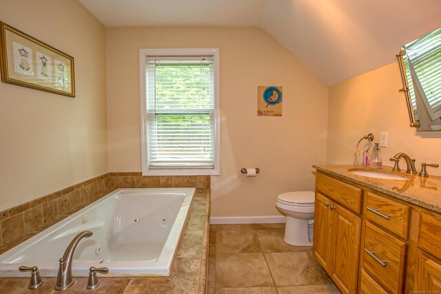 407 Monson Rd, Wilbraham, MA 01095 - bathroom featuring vanity, a jetted tub, vaulted ceiling, and tile patterned floors