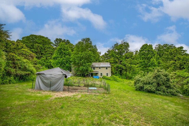 407 Monson Rd, Wilbraham, MA 01095 - view of green lawn with a wooded view