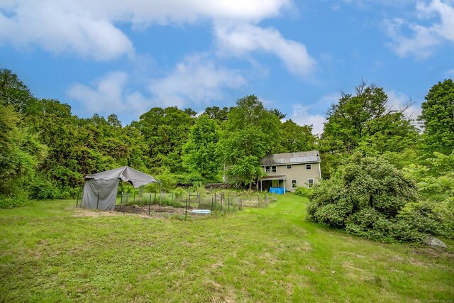 407 Monson Rd, Wilbraham, MA 01095 - view of green lawn with a wooded view