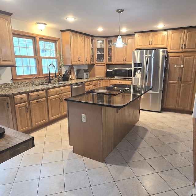 240 Mountain Spring Rd, Tolland, CT 06084 - kitchen with appliances with stainless steel finishes, light tile patterned floors, a center island, dark stone countertops, and recessed lighting