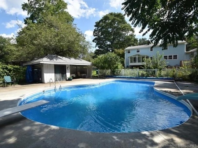 240 Mountain Spring Rd, Tolland, CT 06084 - view of swimming pool featuring a diving board, a patio, and a water slide