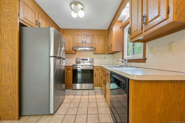 147 Julia Ter Unit 147, Middletown, CT 06457 - kitchen featuring stainless steel appliances, a sink, under cabinet range hood, light countertops, and light tile patterned floors