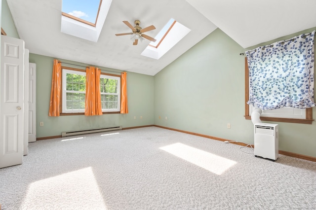 147 Julia Ter Unit 147, Middletown, CT 06457 - unfurnished bedroom featuring a skylight, a baseboard heating unit, carpet flooring, vaulted ceiling, and baseboards