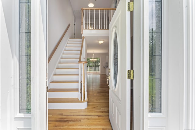 8 Stone Gate Dr, Newtown, CT 06482 - foyer entrance featuring wood finished floors and stairs