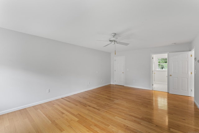 8 Stone Gate Dr, Newtown, CT 06482 - unfurnished room with a ceiling fan and light wood-style flooring