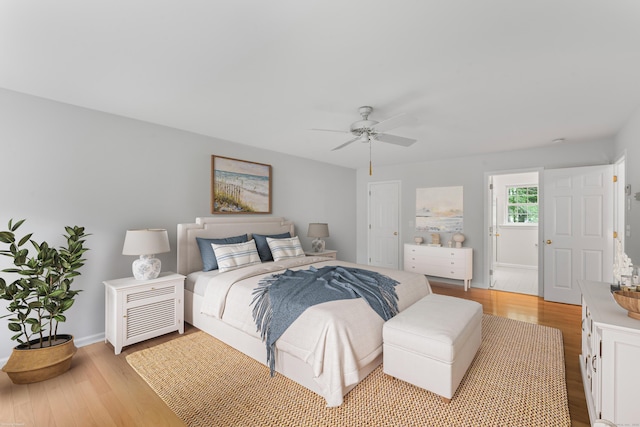 8 Stone Gate Dr, Newtown, CT 06482 - bedroom with light wood-style flooring and a ceiling fan