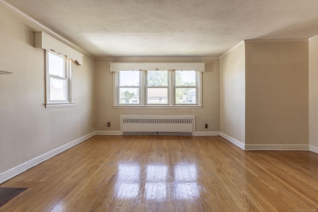 47 Yale St, Hartford, CT 06114 - spare room with radiator, crown molding, wood-type flooring, and a textured ceiling