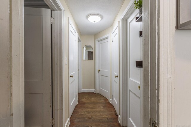 47 Yale St, Hartford, CT 06114 - corridor featuring dark wood-type flooring and baseboards