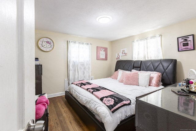 47 Yale St, Hartford, CT 06114 - bedroom with dark wood-style floors and baseboards