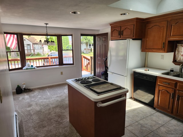 12 Hart Pl, Plainville, CT 06062 - kitchen featuring black dishwasher, light countertops, a kitchen island, pendant lighting, and recessed lighting