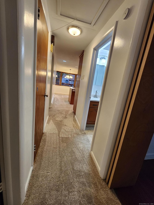 12 Hart Pl, Plainville, CT 06062 - hall featuring light carpet and a chandelier