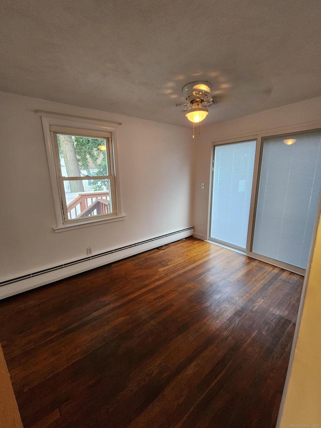 12 Hart Pl, Plainville, CT 06062 - spare room with wood finished floors, a ceiling fan, a baseboard radiator, and a textured ceiling