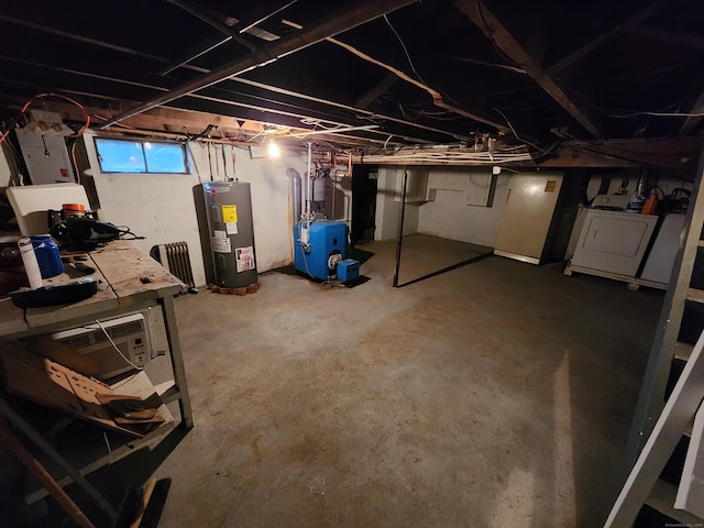 12 Hart Pl, Plainville, CT 06062 - basement with water heater, washer / clothes dryer, and a heating unit