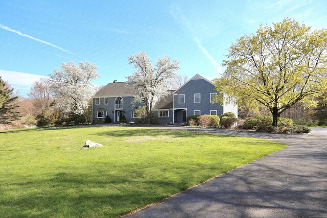 108 Northwood Dr, Easton, CT 06612 - view of front of house featuring a front yard