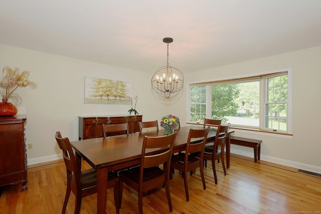 108 Northwood Dr, Easton, CT 06612 - dining area featuring light wood-style flooring, a chandelier, and baseboards