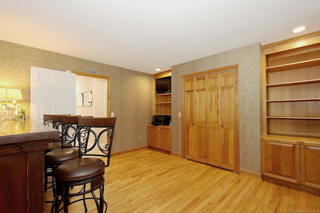 108 Northwood Dr, Easton, CT 06612 - dining room featuring light wood-style floors, baseboards, and built in features