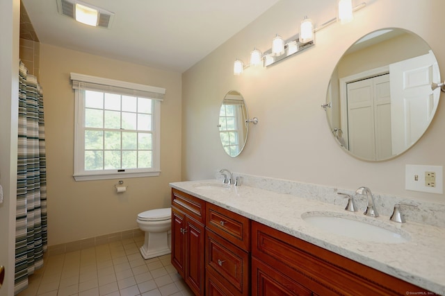 108 Northwood Dr, Easton, CT 06612 - bathroom with double vanity, toilet, tile patterned floors, and baseboards