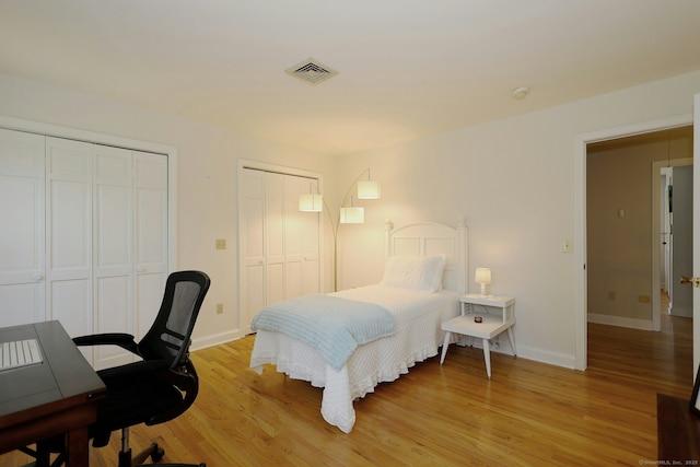 108 Northwood Dr, Easton, CT 06612 - bedroom with two closets, light wood finished floors, an office area, and baseboards