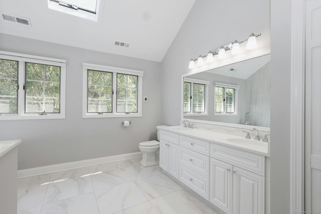 108 Northwood Dr, Easton, CT 06612 - full bathroom with double vanity, lofted ceiling, marble look tiles, baseboards, and a skylight