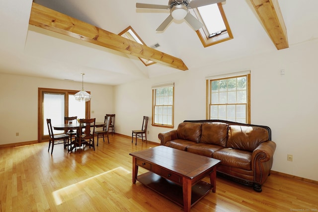 108 Northwood Dr, Easton, CT 06612 - living area featuring ceiling fan, beam ceiling, light wood-style floors, a skylight, and baseboards