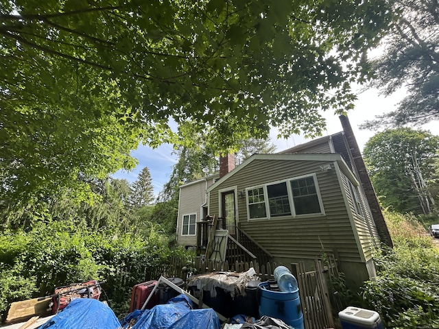 53 Falls Bashan Rd, East Haddam, CT 06469 - view of side of property featuring a chimney