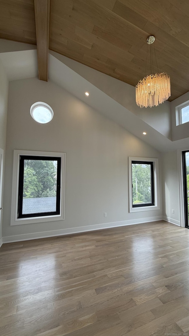 20 N Lake Shore Dr, Brookfield, CT 06804 - empty room with high vaulted ceiling, a chandelier, beamed ceiling, wood finished floors, and baseboards
