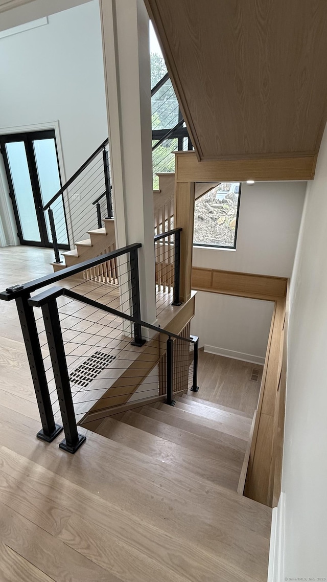 20 N Lake Shore Dr, Brookfield, CT 06804 - stairway with wood finished floors and baseboards
