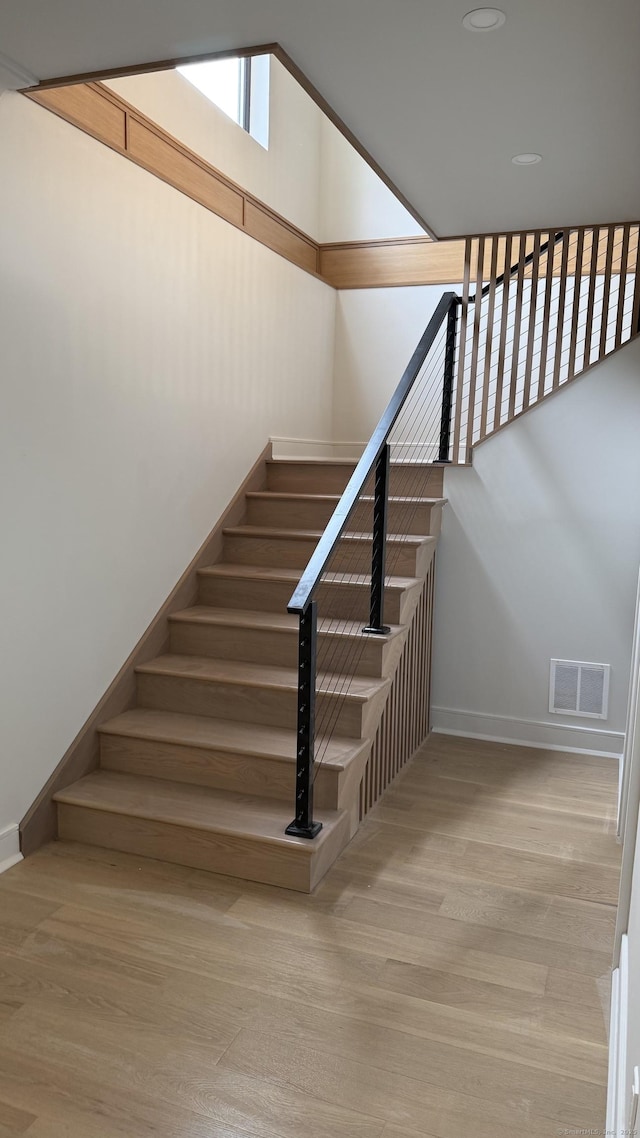 20 N Lake Shore Dr, Brookfield, CT 06804 - stairway with wood finished floors, baseboards, and recessed lighting