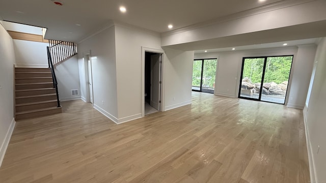 20 N Lake Shore Dr, Brookfield, CT 06804 - empty room with crown molding, baseboards, light wood-type flooring, stairway, and recessed lighting