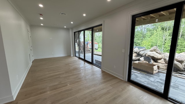 20 N Lake Shore Dr, Brookfield, CT 06804 - spare room with light wood-style floors, baseboards, ornamental molding, and recessed lighting