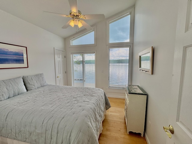 300 Bantam Lake Rd Unit 10, Morris, CT 06763 - bedroom with light wood-style floors, access to outside, baseboards, lofted ceiling, and a ceiling fan